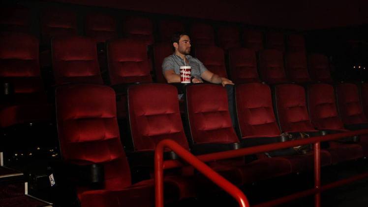movie theater alone
