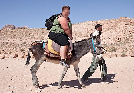 Overwight tourist on donkey - non PIXELATED.JPG